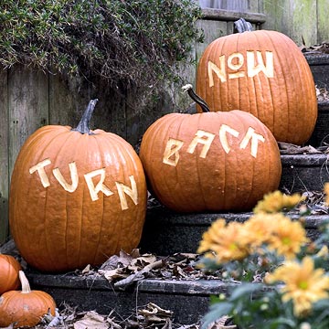 halloween restaurant promotions: place message carved pumpkins near your main entrance